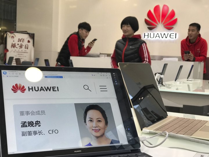 A profile of Huawei's chief financial officer Meng Wanzhou is displayed on a Huawei computer at a Huawei store in Beijing, Ch