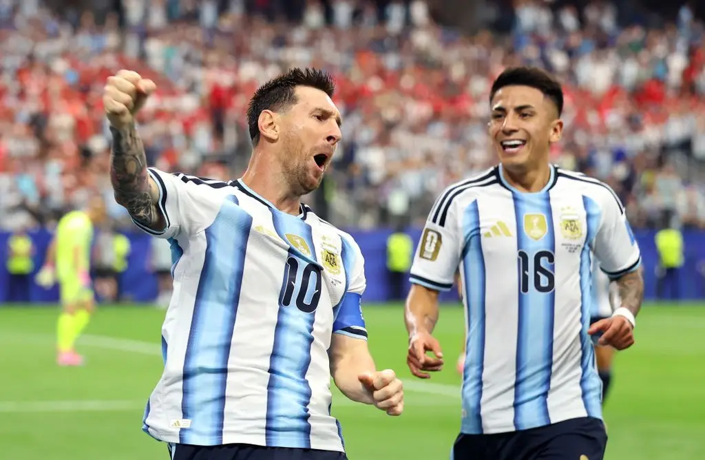 Lionel Messi celebrates his record-setting goal against Austria on Monday.
