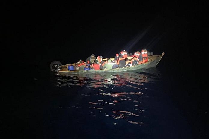 US Navy vessel repatriates’ Dominican migrants in the Mona Passage