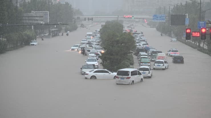 Vehicles are stranded in floodwater near Zhengzhou Railway Station, China