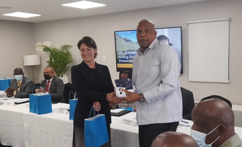 Handing over ceremony of guides to Dominican organizations for standard operating procedures for handling seized cash, confiscation and restraint