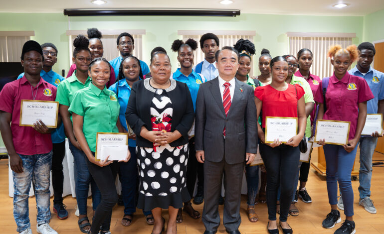 CHINA’S AMBASSADOR TO DOMINICA PRESENTS EDUCATION GRANTS TO TWENTY-TWO DSC STUDENTS