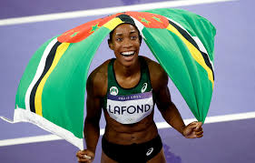 Dominica’s Thea LaFond earning the Olympic gold with a national record jump of 15.02 meters.